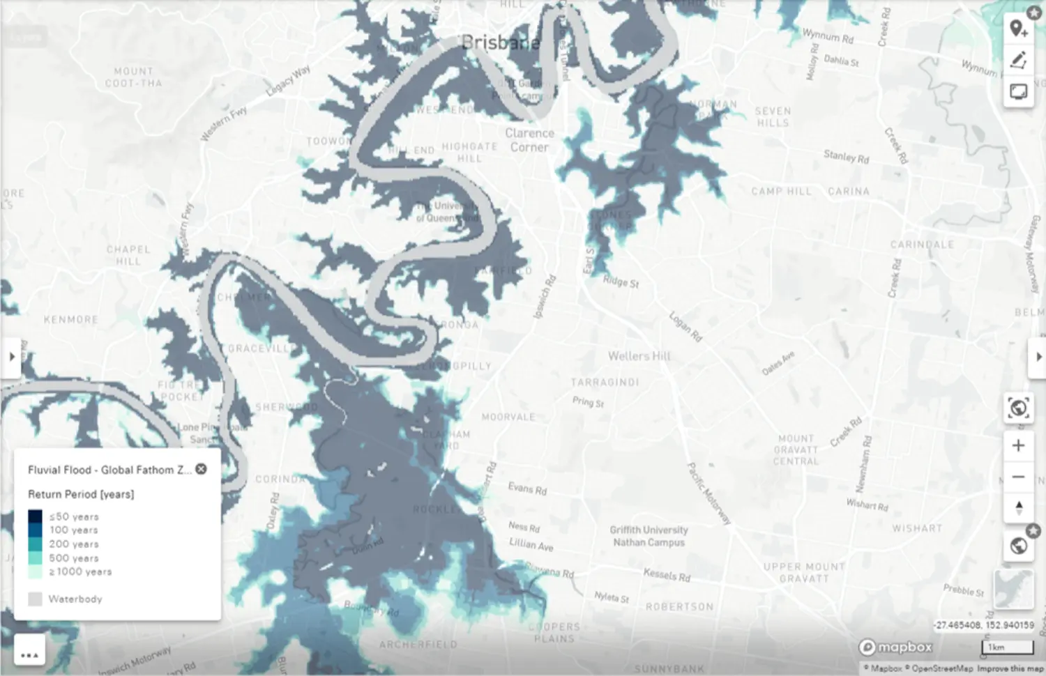 A plotted map on a whiteboard featuring Brisbane's land, sea, and vegetation outdoors, within a natural setting.