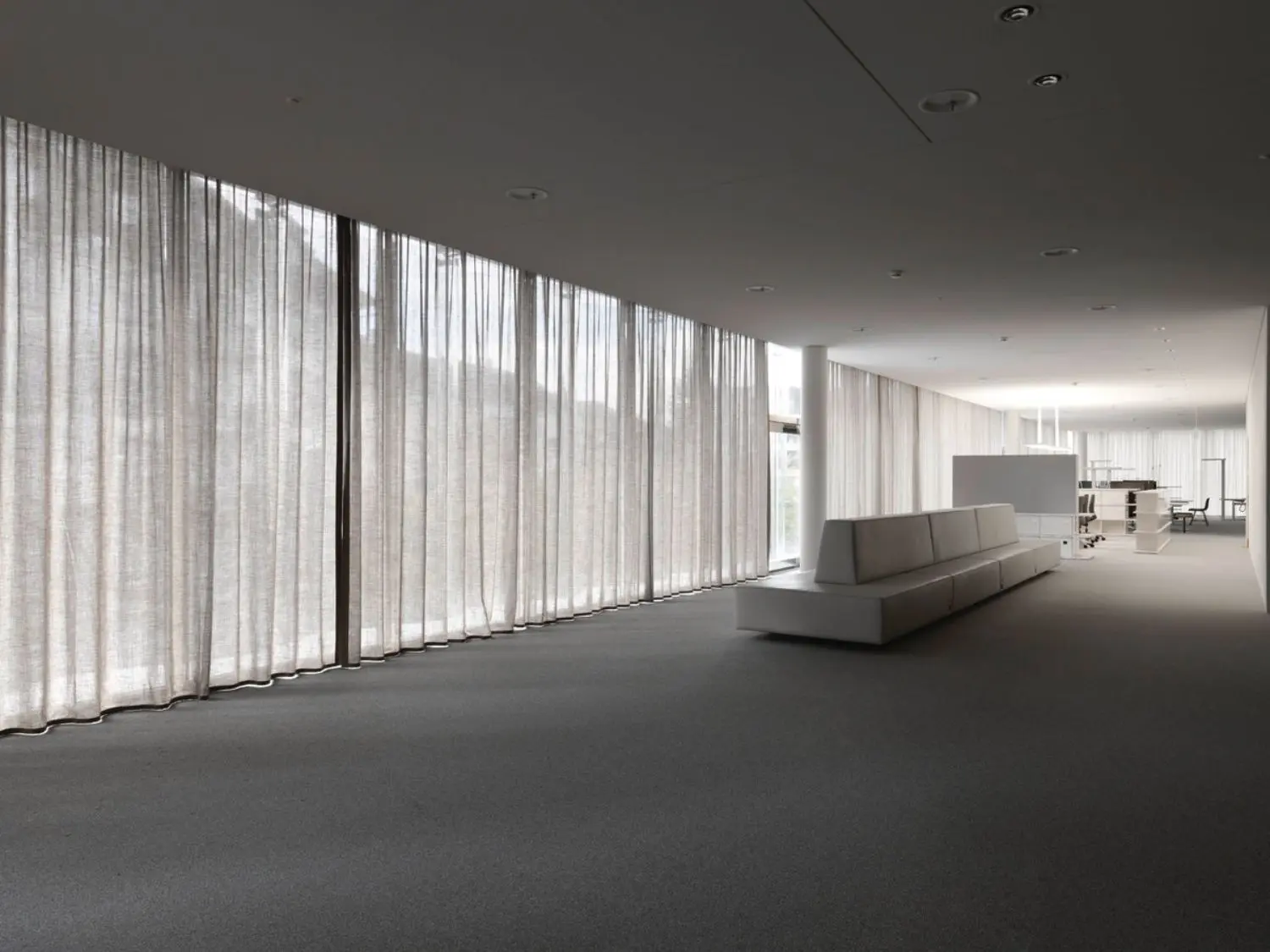 De Rooij's project for Swiss Re Next involved designing curtains tracing the entire exterior façade of the five office floors.