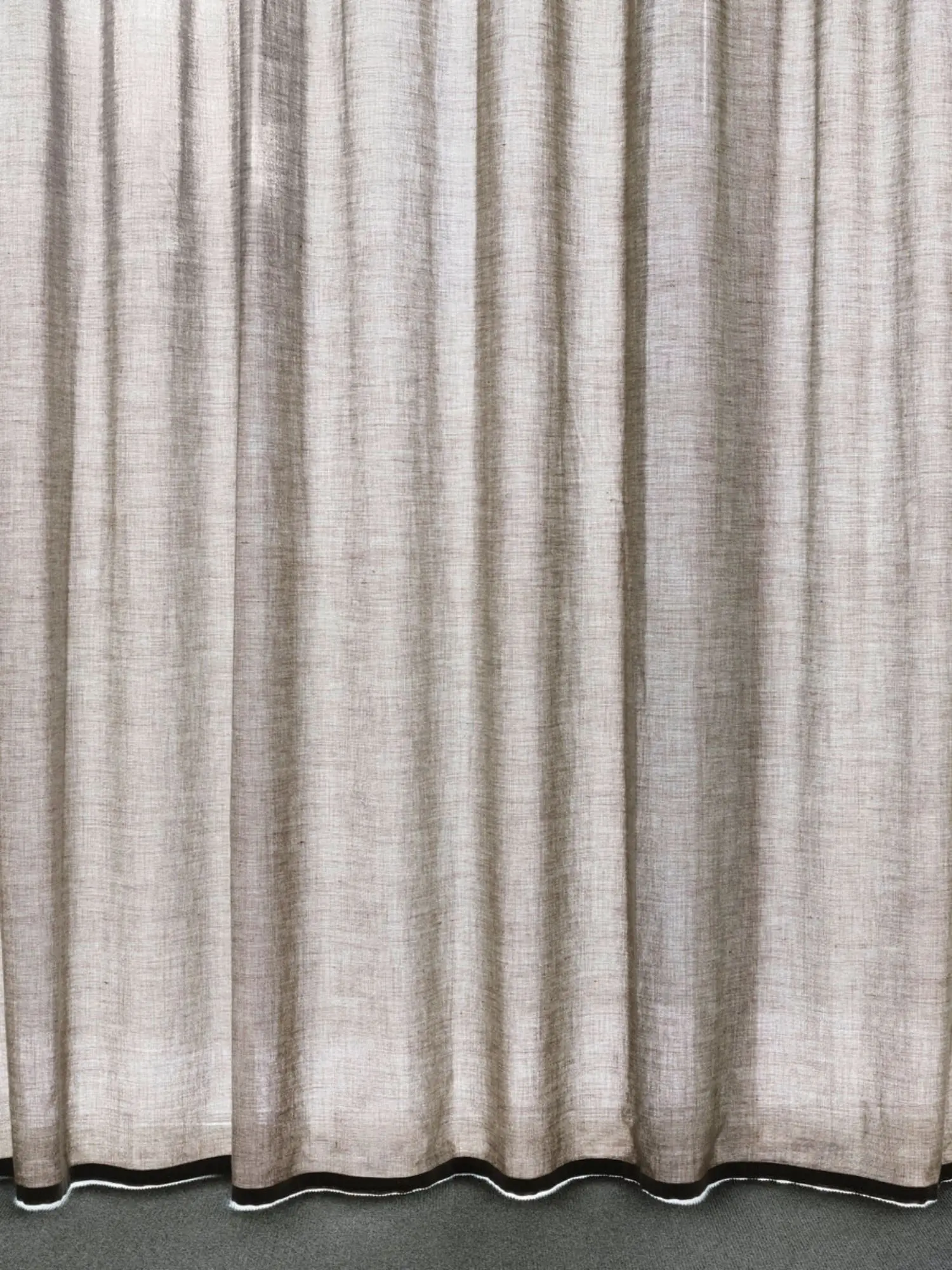 The colour changes gradually from corner to corner, from pale to dark.