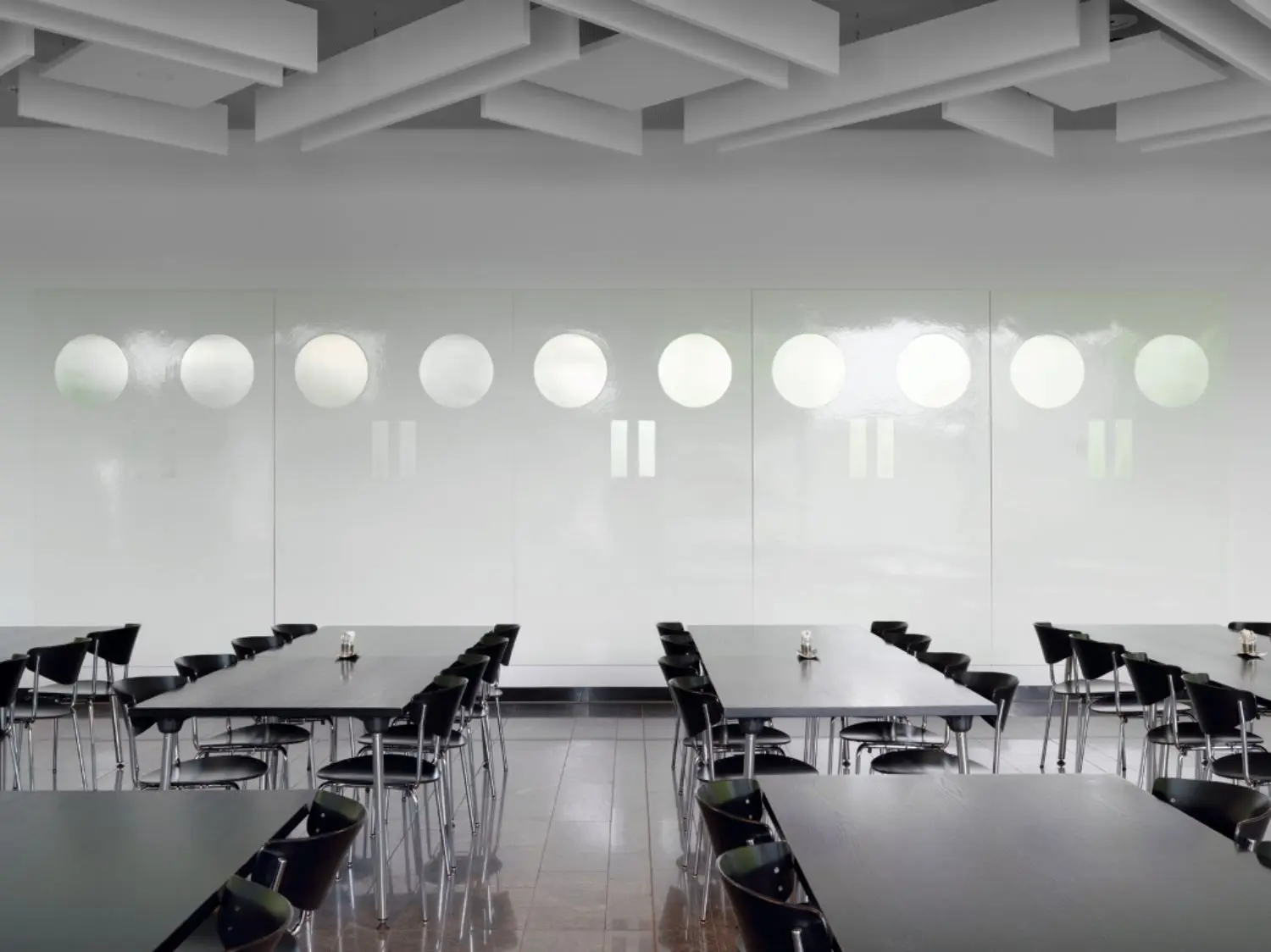 Five enamel painted aluminium panels that stretch over an eight metre length of the restaurant at our Zurich headquarters.