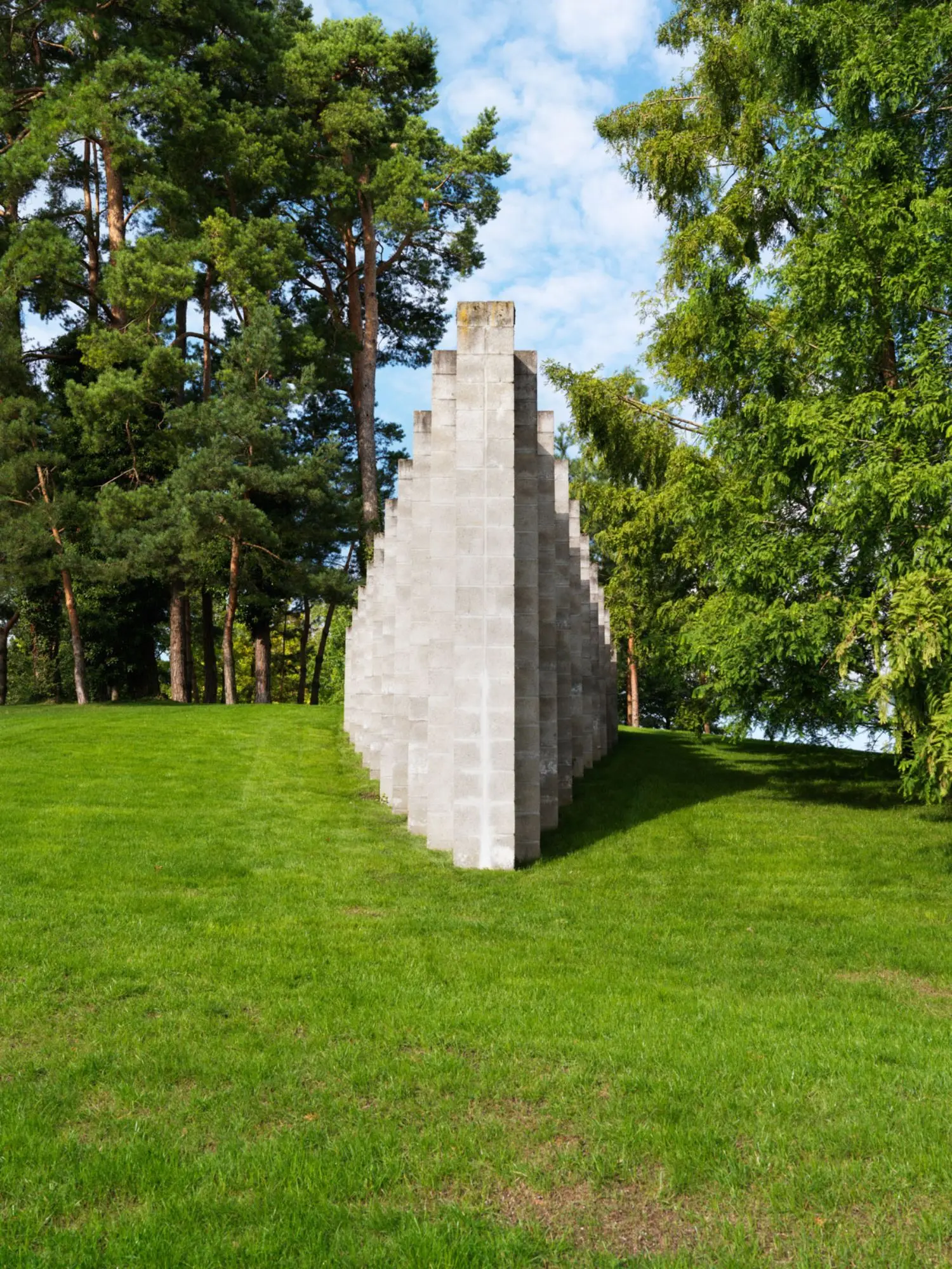 LeWitt began using concrete blocks in the 1980s, and liked the fact that each rectangle could form the building blocks that could be stacked as a repeating motif.