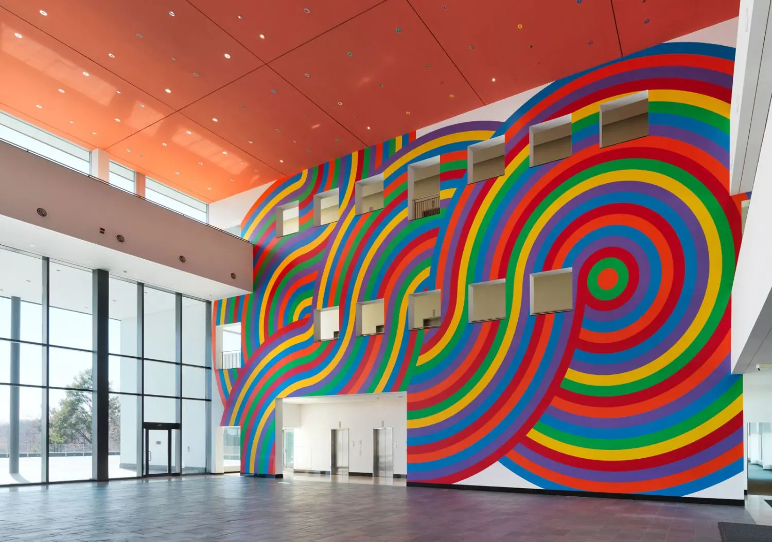 The work has a powerful visual presence for anyone passing through the foyer.